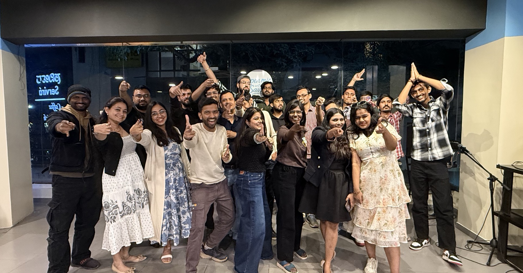 Past 21-Day Level Up cohort members at one of Savan's Open Mic events in Bangalore — a separate community gathering, not part of the Level Up program