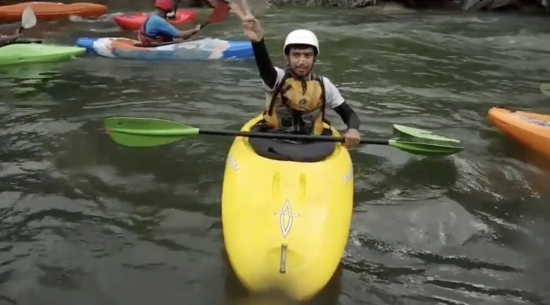 Savan whitewater-kayaking on a river in Kerala
