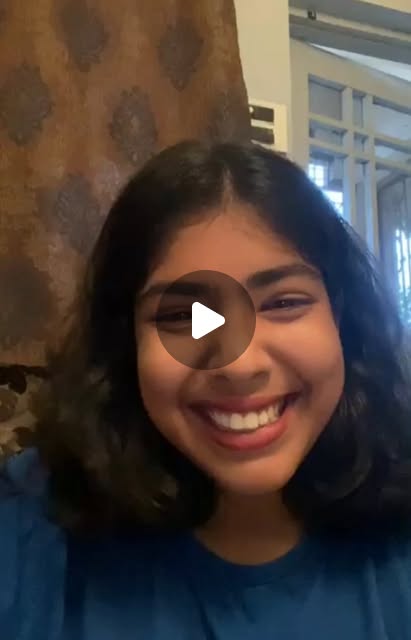 Smiling client recording a reflection on her IGTV